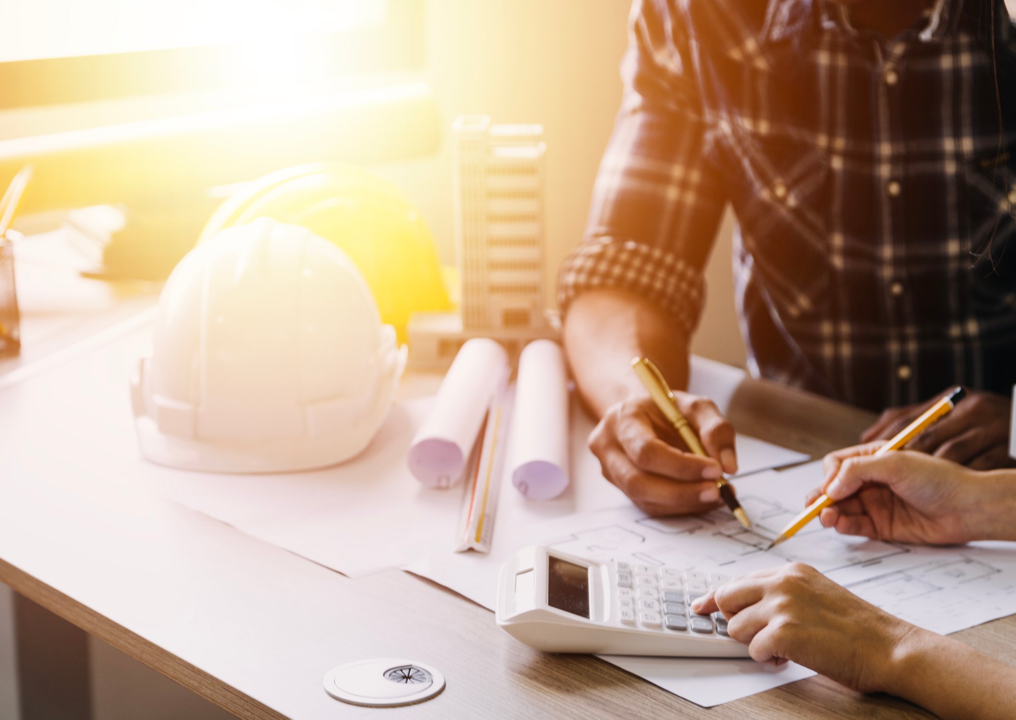 vecteezy_construction-engineer-working-at-blueprint-to-build-large_13681472